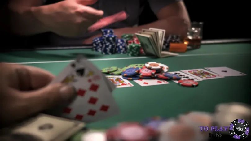 Poker table with visible community cards and chips – learning basic poker rules